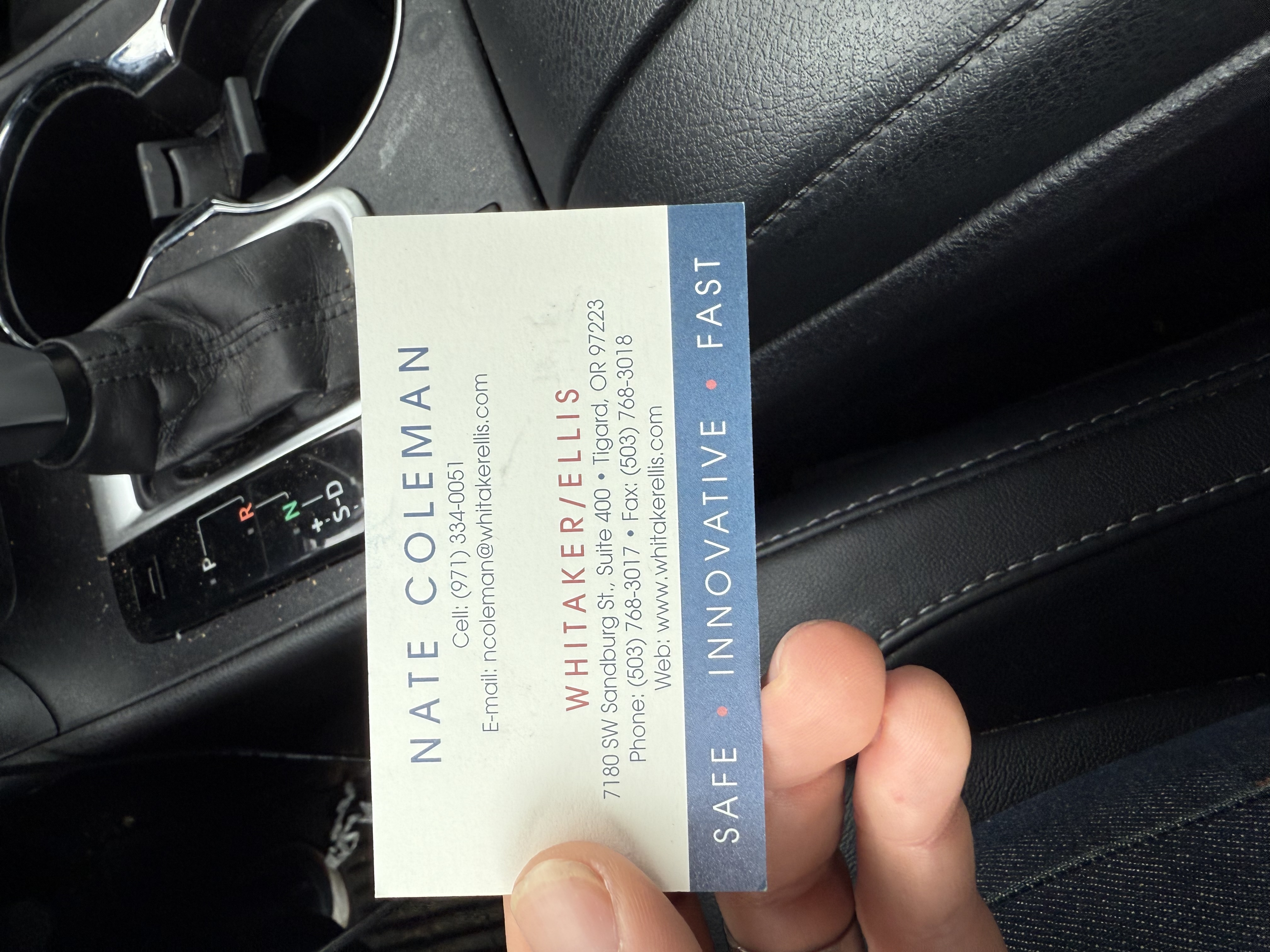 Nate Coleman's Whitaker Ellis business card photographed in the car after the site visit